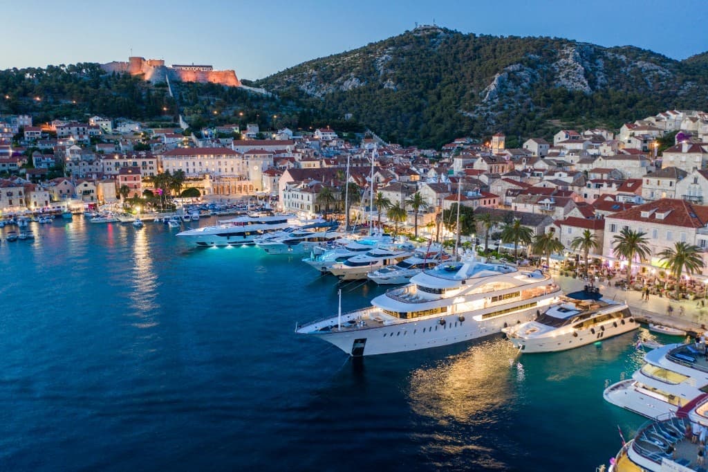 Harbour with yachts at dusk — Onyx Collection yacht charter